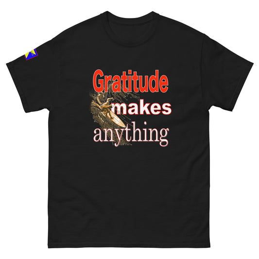 'Gratitude makes anything' headline in mix red and white. Image of surfer in gold under headline 
Refulgent Style logo on right sleeve.
Shirt headline and image works with all colour variations available.
